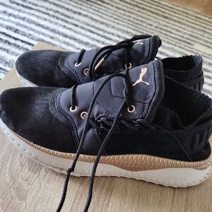 Puma Black and Gold Sneakers